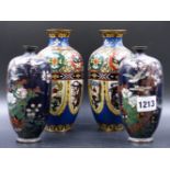 TWO PAIRS OF JAPANESE CLOISONNE VASES, THE MIDNIGHT BLUE PAIR DECORATED WITH BIRDS AND FLOWERS. H.