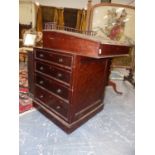 A VICTORIAN MAHOGANY DAVENPORT DESK WITH SLIDING TOP OVER FOUR GRADUATED SIDE DRAWERS. W.56 x H.