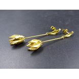 A PAIR OF YELLOW METAL, ASSESSED AS GOLD, HAND MADE DROP EARRINGS IN AN ORGANIC FLORAL FORM,