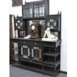 A VICTORIAN AESTHETIC EBONISED SIDE CABINET WITH RAISED CABINET AND MIRROR BACK. W.168cms.