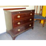 AN ANTIQUE MAHOGANY AND BOXWOOD STRUNG BATCHELOR'S CHEST WITH BRUSHING SLIDE OVER THREE GRADUATED