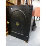A LATE VICTORIAN CAST IRON SAFE COMPLETE WITH KEY. W.51 x H.67 x D.49cms.