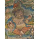 A TIBETAN THANOKA. A DEITY SURROUNDED BY SUBSIDIARY FIGURES EACH WITH AN INSTRUMENT OR HOLDING A