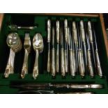 A PART CANTEEN OF PLATED CUTLERY TOGETHER WITH A SET OF SIX SILVER HALLMARKED CASED COFFEE SPOONS.