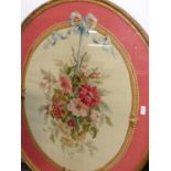 AN ANTIQUE FRENCH AUBUSSON TAPESTRY OVAL PANEL OF A GARLAND OF FLOWERS. 96 x 76cms.