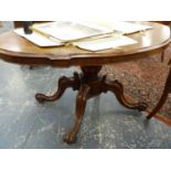 A VICTORIAN WALNUT BREAKFAST TABLE WITH SHAPED OVAL FORM TOP ON QUADRUPED CARVED LEGS. THE TOP 150 x