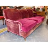 A PAIR OF GOOD QUALITY HOWARD STYLE DEEP SEAT SCROLL ARM SETTEES. W.210cms EACH APPROX.