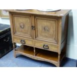 A VICTORIAN AESTHETIC TASTE OAK AND POLLARD OAK VENEERED MUSIC CABINET, THE DOORS INLAID WITH