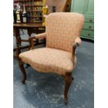AN ANTIQUE CARVED MAHOGANY FRENCH HEPPLEWHITE STYLE ARMCHAIR OF GENEROUS PROPORTIONS WITH SHAPED