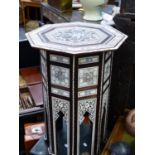AN INLAID SYRIAN OCTAGONAL STAND WITH ELABORATE MOTHER OF PEARL AND BONE GEOMETRIC DECORATION. W.