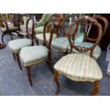 A HARLEQUIN SET OF EIGHT VICTORIAN WALNUT BALLOON BACK DINING CHAIRS WITH SERPENTINE UPHOLSTERED