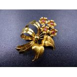AN 18ct HALLMARKED GOLD AND RUBY FLORAL SPRAY BROOCH, MEASUREMENTS 5cms X 4cms, GROSS WEIGHT 10.