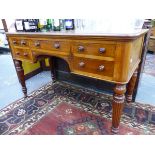 A GOOD VICTORIAN MAHOGANY WRITING TABLE BY EDWARDS & ROBERTS WITH ARRAGEMENT OF FIVE DRAWERS OVER