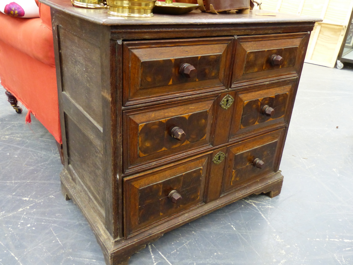 AN 18th.C.OAK SMALL CHEST OF TWO SHORT AND TWO LONG DRAWERS WITH OYSTER VENEER PANEL FRONTS. W.82