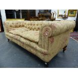 A VICTORIAN BUTTON UPHOLSTERED CHESTERFIELD SETTEE WITH LOOSE FEATHER CUSHIONS. W.APPROX 205cms.