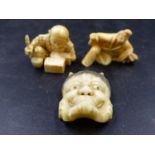 AN ONI NOH IVORY MASK. 3.5cms A MARINE IVORY OKIMONO OF A CRAFTSMAN PAINTING BOXES. W.3.5cms AND A