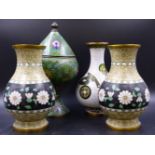 A PAIR OF CHINESE CLOISONNE BALUSTER VASES, THE BLACK BANDS ABOUT THE BODIES WITH WHITE DAISIES. H.