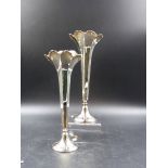 A PAIR OF SILVER HALLMARKED TRUMPET FORM FLUTED VASES FOR MAPPIN AND WEBB. HEIGHT 23.5cms .LOADED