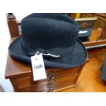 A BOWLER HAT BY LOCK & Co, A TRILBY BY LOCK & Co AND A MORTAR BOARD BY RYDER & AMIES, CAMBRIDGE. (