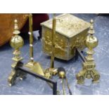 A PAIR OF DUTCH STYLE BRASS FIRE DOGS, A BRASS COAL BOX AND A COMPANION STAND.