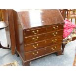 A GEO.III.MAHOGANY BUREAU WITH FITTED INTERIOR OVER FOUR LONG GRADUATED DRAWERS ON BRACKET FEET. W.