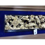 FOUR VARIOUS CHINESE CARVED AND GILT PANELS, MOST OF BIRDS AND FLOWERS. 82 x 17cms. LARGEST. (4)