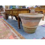 A VERY IMPRESSIVE PAIR OF LARGE TERRA-COTTA TERRACE PLANTERS. Dia.77cms.