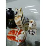 A GROUP OF THREE ROYAL CROWN DERBY PAPERWEIGHTS TO INCLUDE ROUGH COLLIE, SQUIRREL AND A FOX.