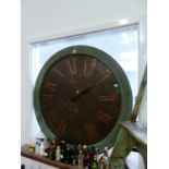A LARGE COPPER CLOCK DIAL IN PAINTED SURROUND. Dia.90cms OVERALL.