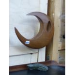 A MID CENTURY WOODEN SCULPTURE ON STONE BASE.