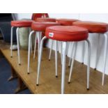 A SET OF SIX MID CENTURY STOOLS ON TAPERED METAL LEGS.