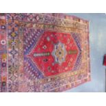 A TURKISH TRIBAL RUG. 234 x 193cms.