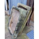 TWO ANTIQUE CARVED STONE SHALLOW PUMP TROUGHS.