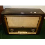 A PHILLIPS BAKELITE CASED RADIO WITH PRE SELECT WAVE LENGTH TUNING.