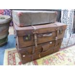 A LARGE LEATHER LUGGAGE SUITCASE. A LEATHER BOUND CANVAS EXAMPLE AND A LAUNDRY BOX.