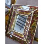 A SMALL EGLOMISE GLASS FRAMED WALL MIRROR. 29 x 34cms.