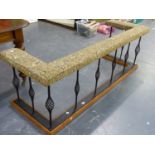 A WROUGHT IRON CLUB FENDER WITH UPHOLSTERED TOP RAIL. W.174 x D.60 x H.59cms.