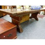 AN INTERESTING LARGE MAHOGANY DINING / LIBRARY TABLE ON STOUT SHAPED END SUPPORTS, THE TOP 273 x