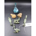 A GROUP OF FOUR EGYPTIAN BRONZE VOTIVE FIGURES, A POTTERY OIL LAMP, A GLASS BOTTLE AND A FIGURAL FR