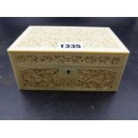 A 19th.C.INDIAN IVORY RECTANGULAR BOX CARVED IN RELIEF WITH BEAD FRAMED SCROLLING FLOWERING VINES.