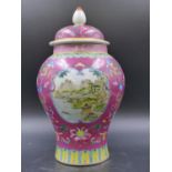 A CHINESE FAMILLE ROSE COVERED VASE, LANDSCAPE PANELS WITH CIRCULAR CHARACTER ROUNDELS, SEAL MARK TO