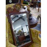 AN ANTIQUE GEORGIAN STYLE WALNUT FRET FRAMED WALL MIRROR. 90 x 48cms.