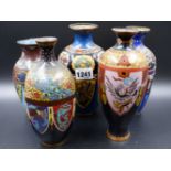FIVE JAPANESE CLOISONNE BALUSTER VASES WITH VARYING DECORATION. LARGEST. 18.5cms.