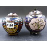TWO JAPANESE BLUE GROUND CLOISONNE COVERED JARS, THE SHOULDERS OF ONE WORKED WITH TWO PHOENIX