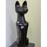 A 1960'S CARVED HARDWOOD FIGURE OF A SEATED CAT.