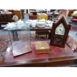 AN AMERICAN LANCET TOP MANTLE CLOCK, A SMALL INLAID TABLE BOX AND A GLASS DISPLAY CASE. (3)