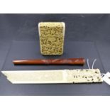 A CHINESE IVORY RELIEF CARVED CARD CASE, A PAGE TURNER WITH FIGURAL HANDLE, 27cms AND A BROWN