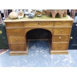 A LATE VICTORIAN MAHOGANY TWIN PEDESTAL DESK WITH ARRANGEMENT OF NINE DRAWERS ON PLINTH BASE. W.