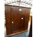 A SMALL COUNTRY ELM AND OAK WALL CABINET WITH SINGLE PANEL DOOR. W.44 x H.45cms.