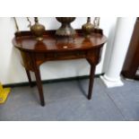 A INLAID MAHOGANY GEO.III STYLE DEMI LUNE SIDE TABLE. BRASS BACK RAIL. APRON DRAWER FLANKED BY